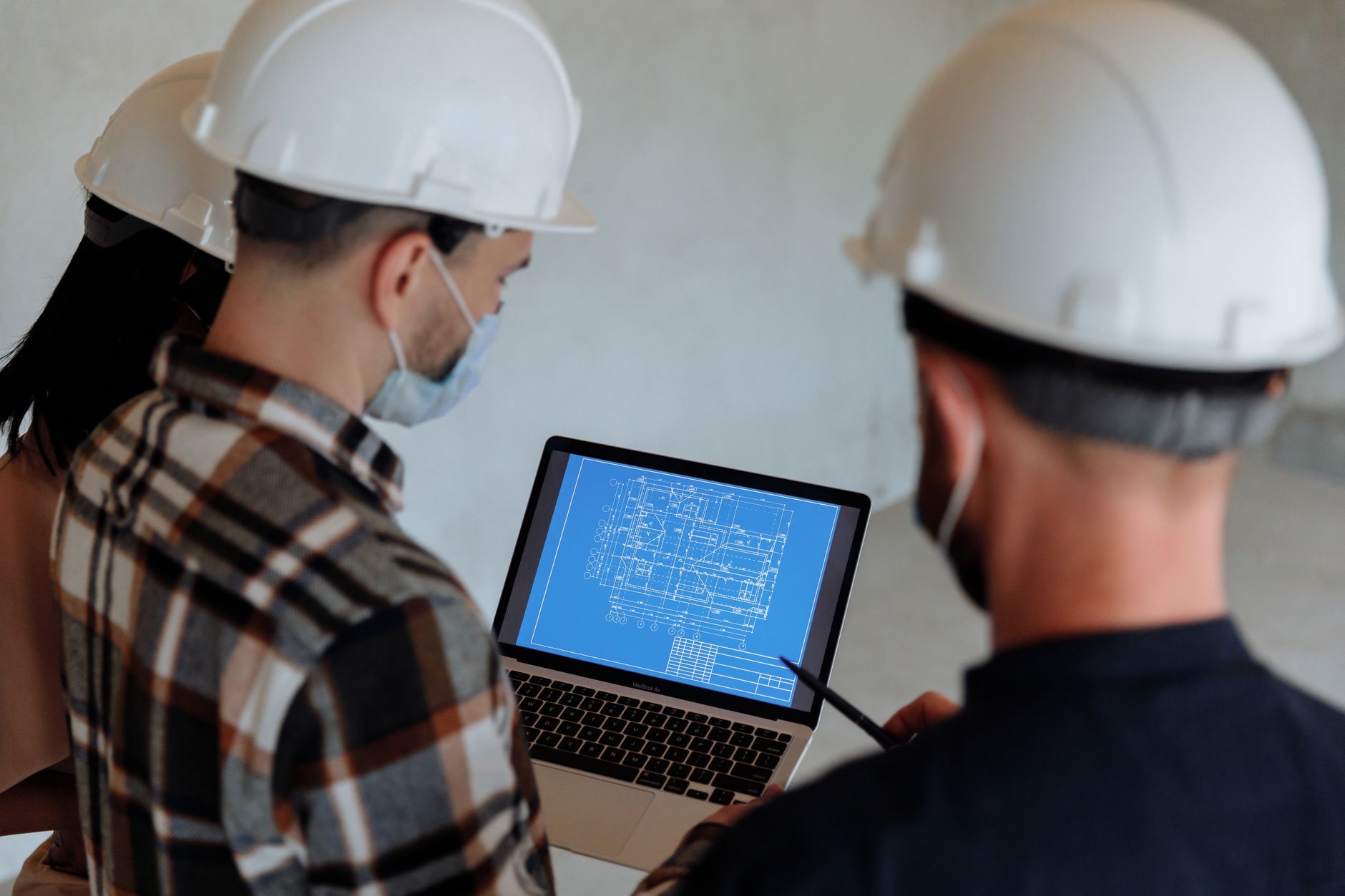 Professional team working at stone factory