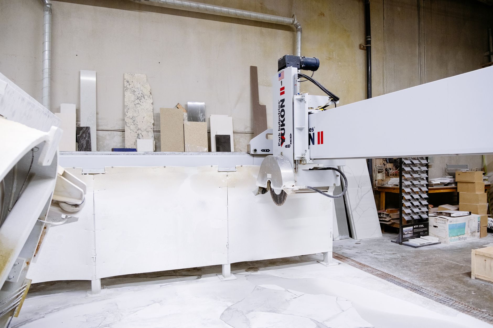 Working at marble cutting machine factory